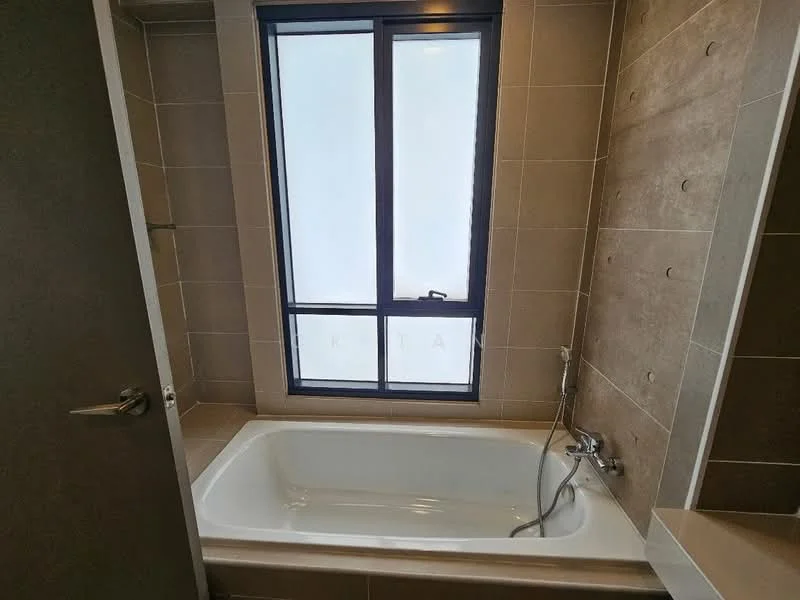 Bathroom features: built-in bathtub, chrome handheld shower, tile cladding on walls, grey ceramic tile flooring, window with black frame, shower mixer, neutral wall tiles, light fixture, toilet roll holder; style: modern.