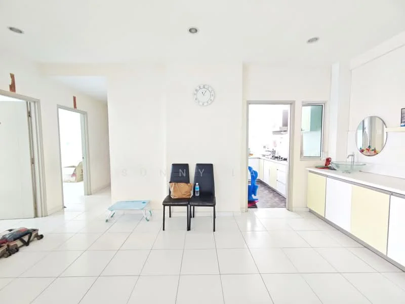 Room features: white painted walls, white tiled flooring, clock on wall, two black chairs, kitchen visible in background, doorway leading to another room, window with natural light, open layout; style: modern.