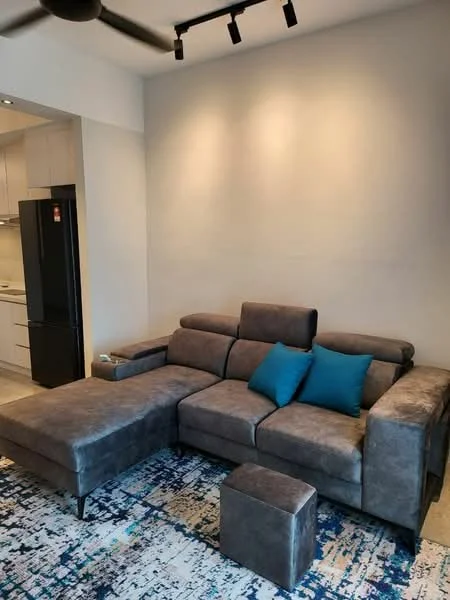 Living features: L-shape sectional sofa in grey, two blue accent pillows, small ottoman, area rug with abstract pattern, recessed lighting, wall-mounted track lighting, light-colored walls, tile flooring; style: modern.
