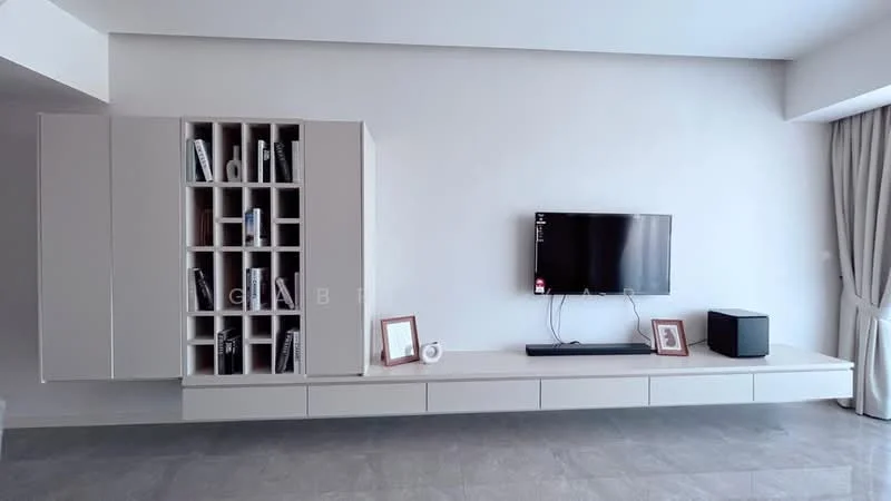 Living features: light grey tiled flooring, white painted walls, built-in wall-mounted TV unit, floating TV console, open shelving with books, framed artwork on console, black speaker, curtains, natural light from windows; style: modern.