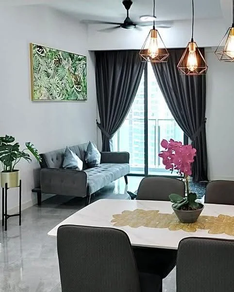 Dining features: white dining table, 4 upholstered dining chairs, decorative table runner, potted orchid centerpiece, pendant lighting with geometric design, grey fabric sofa, floor-to-ceiling windows, sheer curtains, dark grey curtains, ceiling fan, framed artwork with tropical theme, polished concrete flooring; style: modern; view: city.