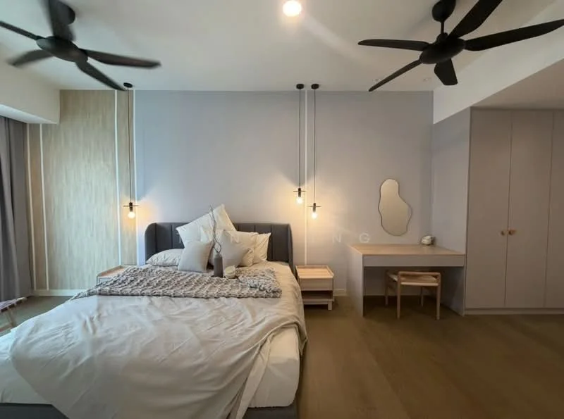 Bedroom features: king-size bed with upholstered headboard, white bedding, 2 pendant lights hanging above bedside tables, wooden bedside tables, study desk with chair, built-in wardrobe with sliding doors, light wood flooring, 2 ceiling fans with black blades, accent wall with wood paneling, decorative mirror on wall; style: modern.