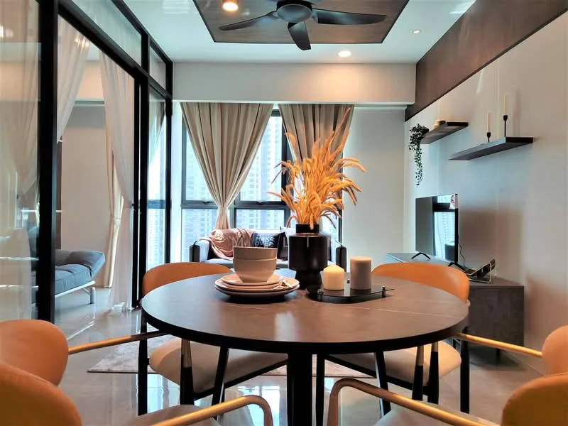 Dining features: round dining table, 4 upholstered dining chairs, decorative vase with dried flowers, candles, wall-mounted shelf, floor-to-ceiling windows, sheer curtains, grey accent wall, ceiling fan with light, recessed downlights, plush area rug; style: modern; view: city. Living features: fabric sofa in grey, throw pillows, TV console, wall-mounted TV; style: modern; view: city.