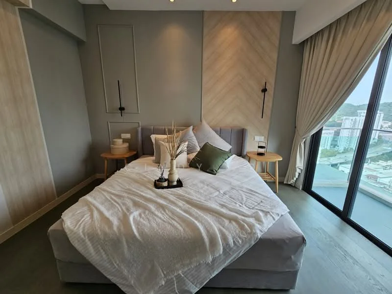 Bedroom features: king-size bed with grey upholstered headboard, white bedding with textured throw, green accent pillow, two round side tables in light wood, wall-mounted sconces, large floor-to-ceiling windows, curtains in light fabric, wooden flooring, decorative vase with dried plants, geometric wall paneling; style: modern; view: city.
