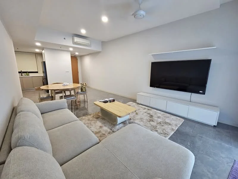 Living features: 3-seater fabric sofa in light grey, coffee table, TV console, wall-mounted TV, area rug with neutral tones, recessed downlights, ceiling fan, grey tiled flooring, white feature wall, open layout to kitchen, decorative items on coffee table; style: modern.