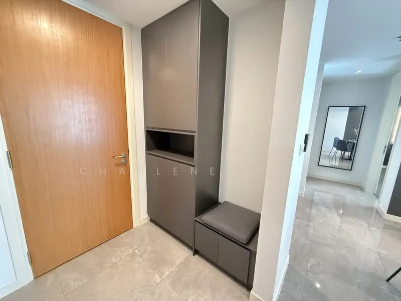 Room features: grey cabinetry, built-in storage unit, bench seating, white walls, marble tile flooring, wooden door, full-length mirror, recessed lighting; style: modern.