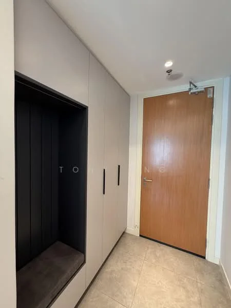 Room features: grey cabinetry, black accent wall, wooden door, tile flooring, recessed lighting, built-in storage, wall-mounted coat hooks, neutral wall color; style: modern.