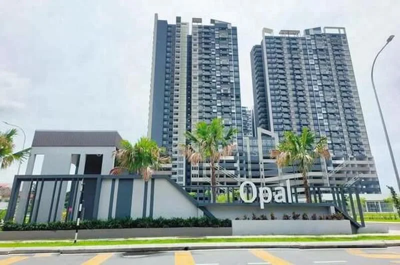 Exterior type: high-rise condominium; features: glass curtain wall, grey painted facade, recessed balconies, landscaped garden with palm trees, manicured lawn, signage with 'Opal', surrounded by mature greenery, modern architectural design; style: modern.
