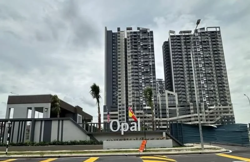 Exterior type: high-rise condominium; features: modern facade with glass and concrete, prominent signage with 'Opal', surrounding landscaping with palm trees, multiple storeys visible, balconies on upper floors, entrance area with covered walkway, road access with yellow lane markings; style: modern.