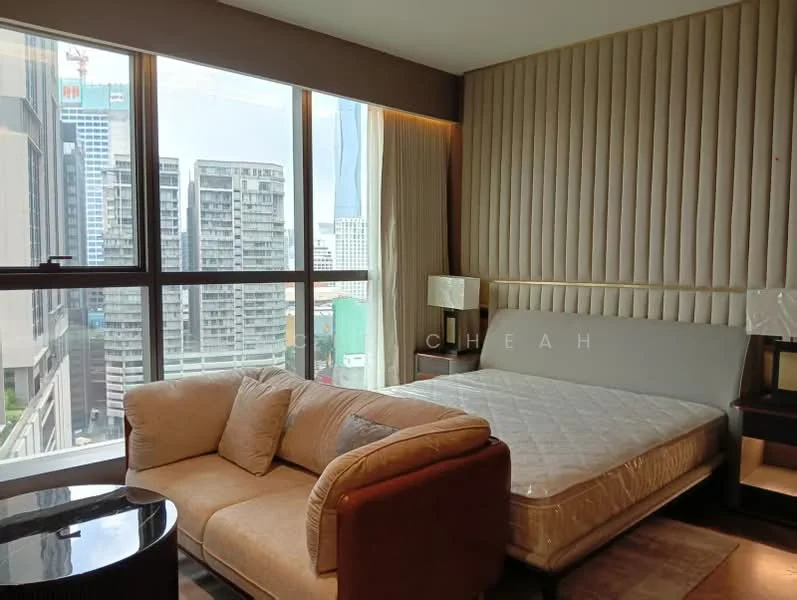 Bedroom features: floor-to-ceiling windows, beige upholstered headboard, queen-size bed, light wood bedside tables, cream wall paneling, sofa in light beige fabric, dark wood coffee table, city view, recessed lighting; style: modern; view: city.
