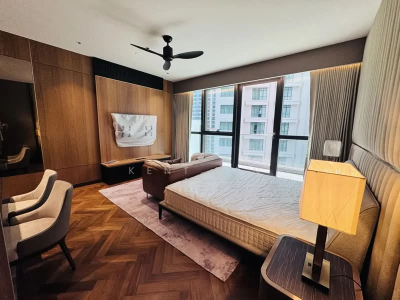 Bedroom features: king-size bed, upholstered headboard, wooden flooring, floor-to-ceiling windows, sheer curtains, 5-blade ceiling fan, wall-mounted TV, decorative mirror, side table with lamp, armchair, area rug with geometric pattern, wood paneling on walls; style: modern; view: city.