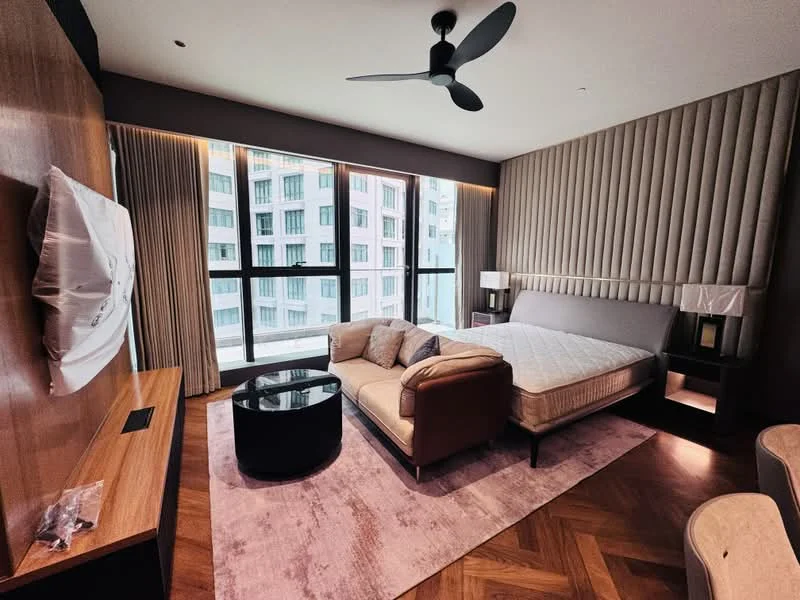 Bedroom features: king-size bed, upholstered headboard, 2 bedside lamps, wall-mounted TV, 5-blade ceiling fan, floor-to-ceiling windows, curtains, wooden flooring, area rug with geometric pattern, sofa, coffee table, decorative wall paneling; style: modern; view: city.