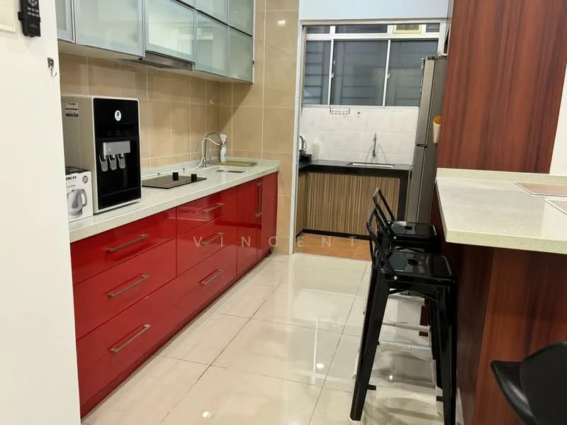 Kitchen features: red cabinetry with flat-panel doors, white countertop, stainless-steel sink, chrome pull-down faucet, built-in stove with two burners, built-in oven, stainless-steel refrigerator, microwave, bar seating with two black stools, tile flooring, cream painted walls, window with metal frame, light-colored backsplash; style: modern.