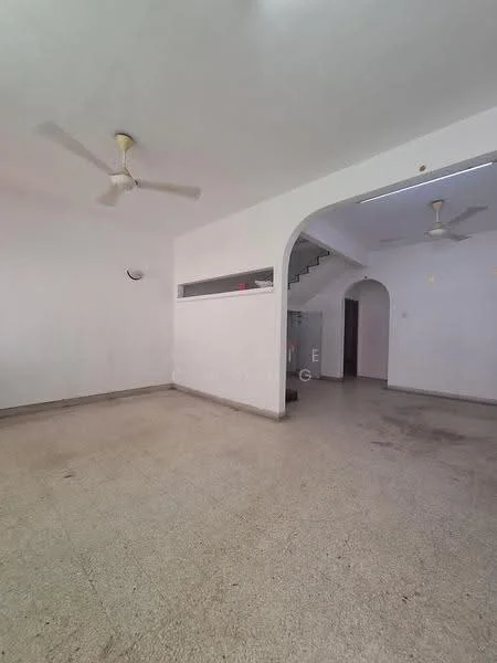 Living features: white painted walls, ceiling fan, light-colored flooring, arched doorway, open layout, natural light from windows, staircase visible in background, no visible furniture.