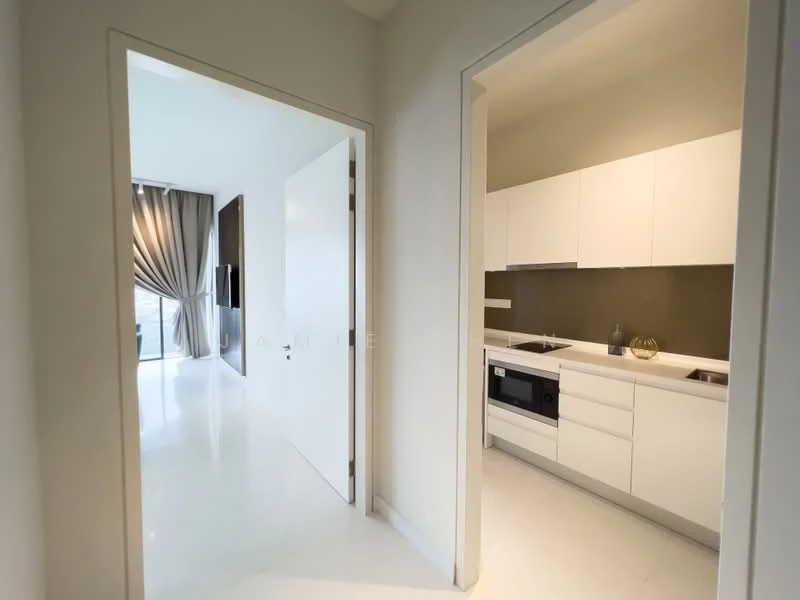 Kitchen features: white cabinetry, built-in microwave, stainless-steel sink, chrome faucet, countertop with dark surface, integrated appliances, tile backsplash, recessed lighting; style: modern. Room features: white walls, light-colored flooring, doorway leading to kitchen, curtains visible in adjacent room.