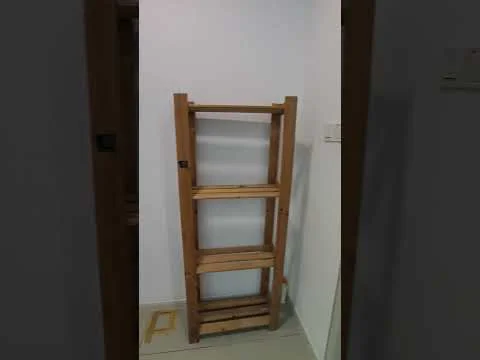 Room features: wooden shelving unit, 4 shelves, light wood finish, minimalist design, neutral wall color, tile flooring; style: minimalist.