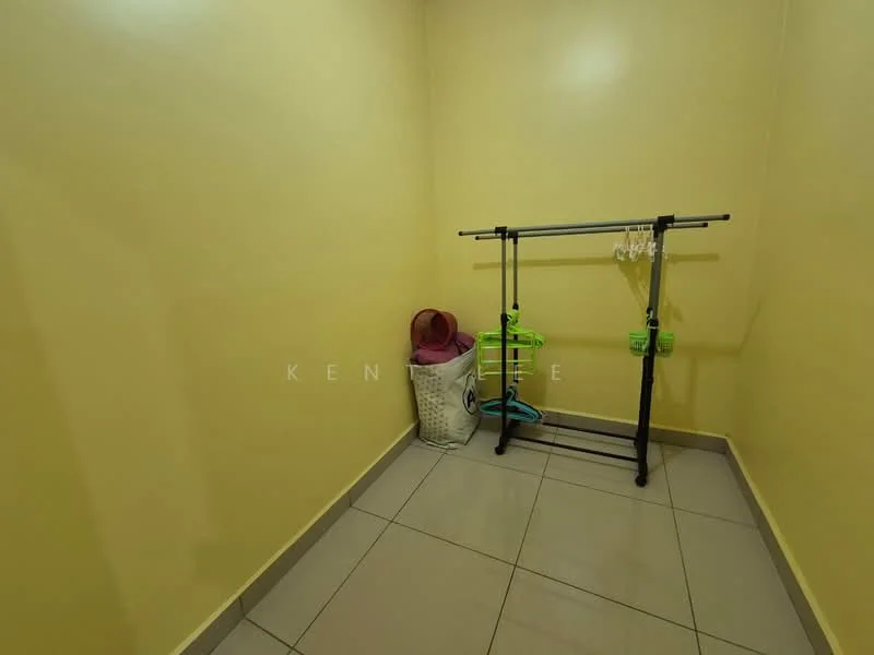 Room features: yellow painted walls, ceramic tile flooring, clothes drying rack, woven laundry basket, green plastic hangers.