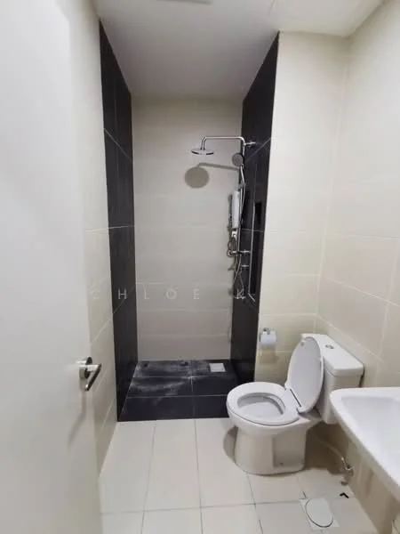Bathroom features: walk-in shower with glass enclosure, rain shower head, handheld shower, white toilet, white sink, black tile flooring, light beige wall tiles, dark accent wall, chrome shower fixtures, towel holder, toilet paper holder; style: modern.