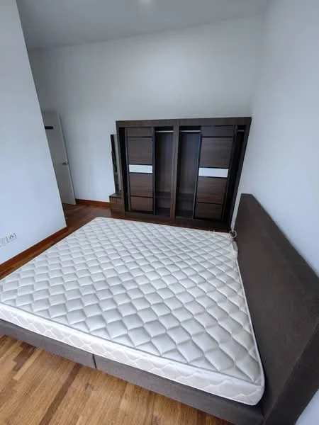 Bedroom features: queen-size bed frame, mattress without bedding, dark wood wardrobe with sliding doors, light wood flooring, white painted walls, window with no visible treatment, minimalist decor; style: modern.