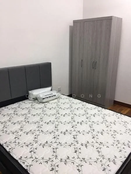 Bedroom features: queen-size bed with grey upholstered headboard, mattress with floral pattern, grey wardrobe with two doors, wooden flooring, white painted walls, decorative pillows on bed; style: modern.