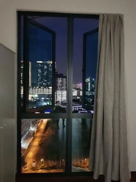 Room features: floor-to-ceiling windows, curtains, city skyline view, nighttime lighting, glass window frame; view: city.