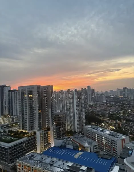Exterior type: high-rise condominium; features: city skyline view, multiple high-rise buildings, sunset sky, mixed-use development, visible rooftops, urban landscape; style: modern.