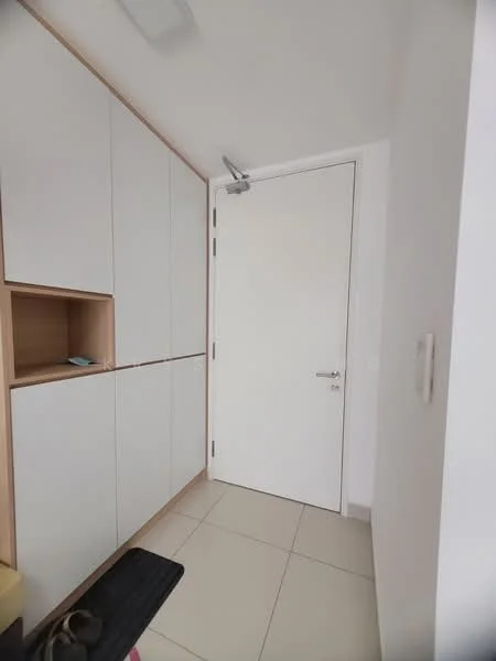 Room features: white painted walls, light-colored cabinetry, built-in storage cabinets, plain white door, tile flooring, door handle, corner shelving, neutral color scheme; style: modern.