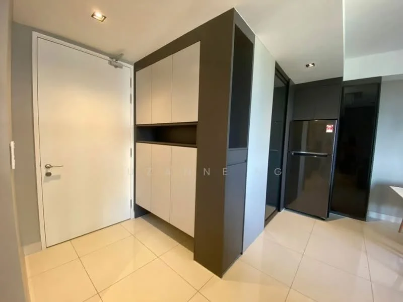 Room features: white painted walls, grey cabinetry, black refrigerator, glossy tile flooring, recessed lighting, door with modern handle, built-in storage, corner layout; style: modern.