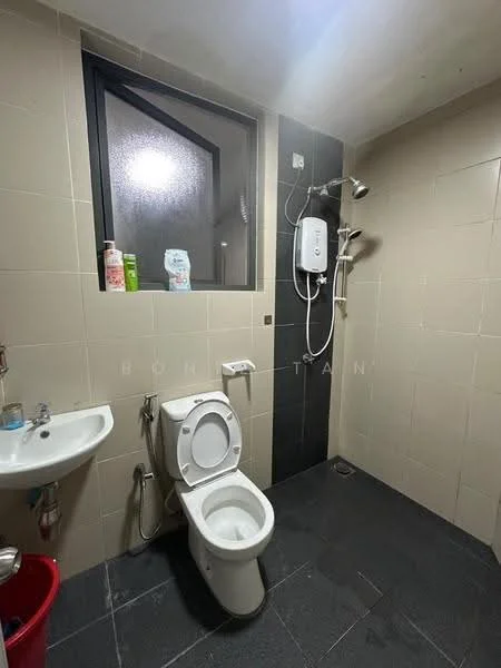 Bathroom features: white toilet, wall-mounted shower with handheld attachment, chrome shower faucet, black tile flooring, cream tiled walls, small wall-mounted sink, mirror above sink, window for natural light; style: modern.