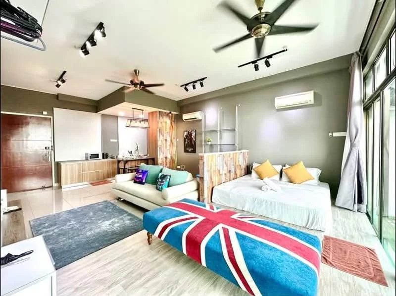 Living features: 3-blade ceiling fan, 2-seater fabric sofa in cream, area rug with geometric pattern, coffee table, wall-mounted TV, wooden accent wall, floor-to-ceiling windows, decorative throw pillows in yellow, blue and red patterned ottoman, light wood flooring, recessed downlights, air conditioning unit; style: modern; view: city.