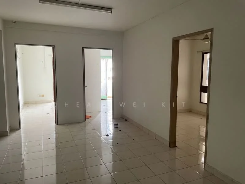 Room features: white painted walls, ceramic tile flooring, multiple doorways, windows with natural light, ceiling light fixture, neutral color scheme, open layout, clean and empty space.