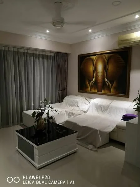 Living features: 3-seater fabric sofa covered with white sheet, black coffee table, wall-mounted air conditioning unit, large artwork featuring an elephant, curtains covering large windows, recessed ceiling lights, cream painted walls, light-colored flooring, decorative plant in ceramic pot, ceiling fan; style: modern.