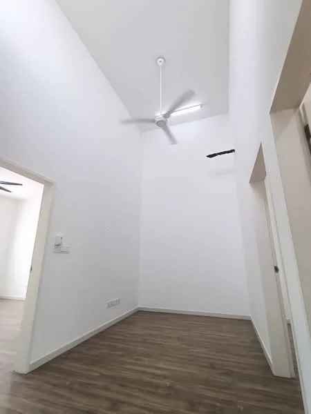 Room features: white painted walls, high ceiling, 5-blade ceiling fan, laminate flooring, doorway leading to another room, light switch on wall; style: modern.