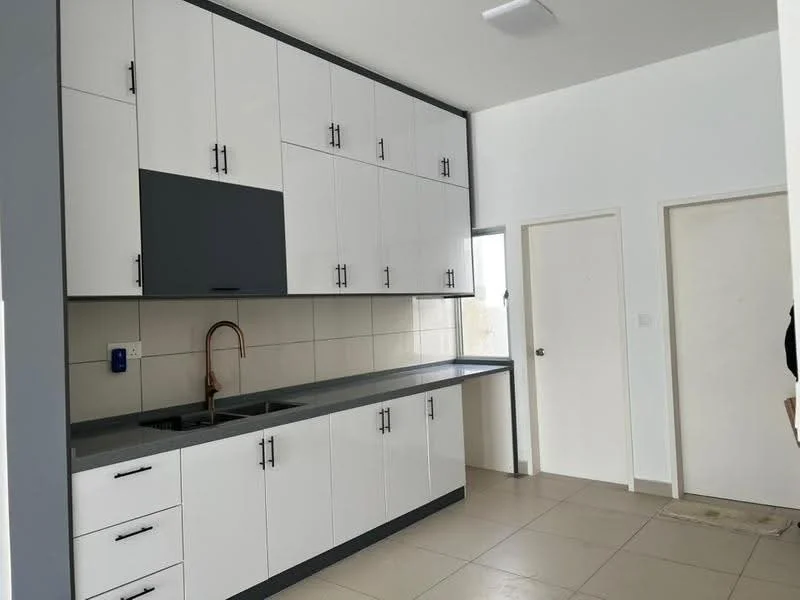 Kitchen features: white cabinetry with grey accents, stainless-steel sink, chrome pull-down faucet, grey countertop, tile backsplash, built-in cabinets, wall-mounted electrical outlet, floor-to-ceiling cabinets, light-colored tile flooring, neutral wall color, door leading to another room; style: modern.