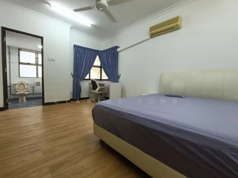 Bedroom features: queen-size bed with upholstered headboard, wooden flooring, white painted walls, ceiling fan, window with blue curtains, study desk, chair, air conditioning unit, built-in wardrobe, en-suite bathroom visible through door; style: modern.