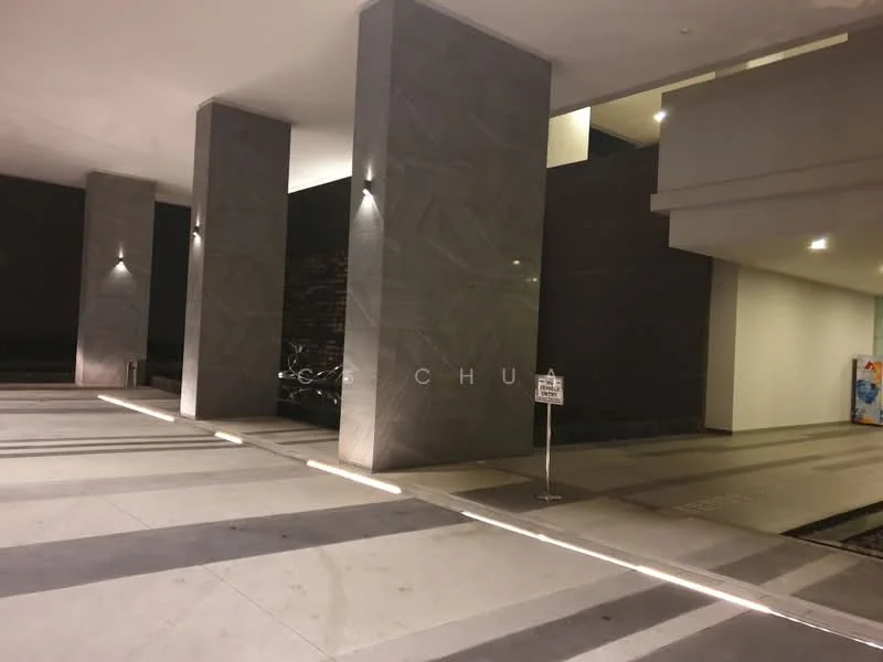 Exterior type: parking deck; features: polished concrete flooring, grey stone cladding on columns, indirect lighting on columns, signage for parking, bicycle racks visible, smooth wall surface, modern architectural design; style: modern.