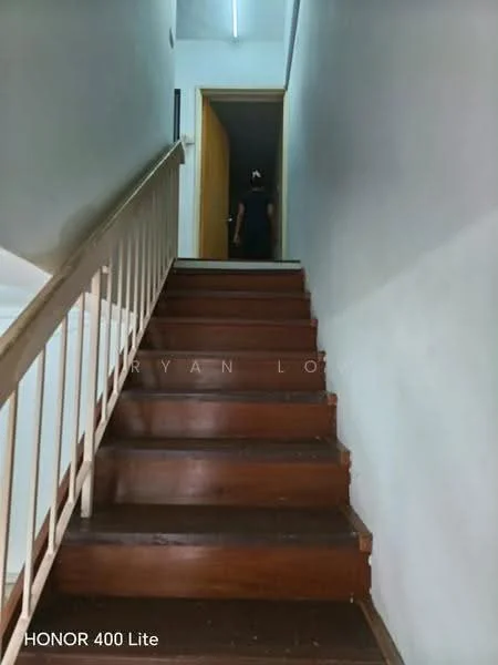 Room features: wooden staircase, white painted walls, ceiling light, handrail, doorway at the top of the stairs, carpeted landing.
