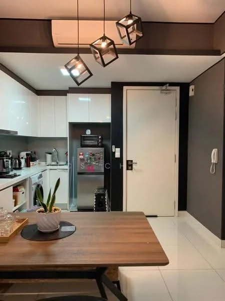 Kitchen features: white cabinetry, black countertop, stainless-steel fridge, built-in oven, 4-burner gas hob, microwave, kitchen island, pendant lighting, white tiled flooring, wall-mounted split AC, dining table, decorative plant in pot; style: modern.