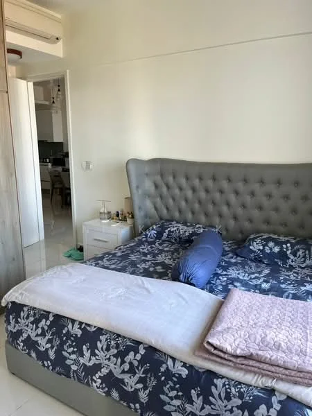 Bedroom features: king-size bed with upholstered headboard, bedding with floral pattern, decorative throw pillows, nightstand with lamp, white painted walls, tile flooring, built-in wardrobe, window with natural light; style: modern.