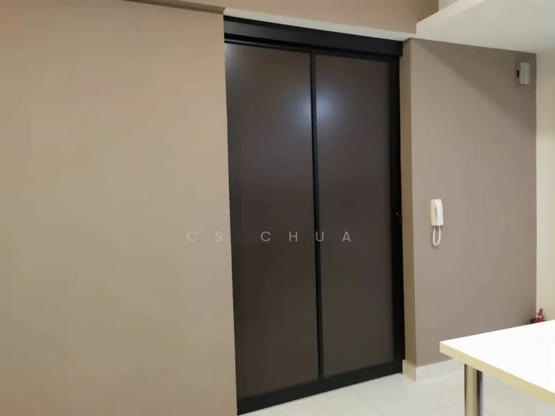 Room features: sliding glass door, cream painted walls, light-colored flooring, intercom panel.