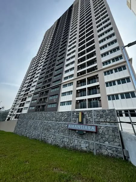 Exterior type: high-rise condominium; features: glass curtain wall, concrete facade, recessed balconies, landscaped garden area, signage with name 'AMANSIARA', multiple storeys, large windows, manicured lawn; style: modern.