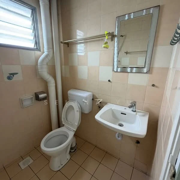 Bathroom features: white ceramic toilet, single-sink wall-mounted basin, chrome faucet, framed mirror, beige tiled walls, light beige floor tiles, toilet paper holder, towel rack, window with horizontal slats.