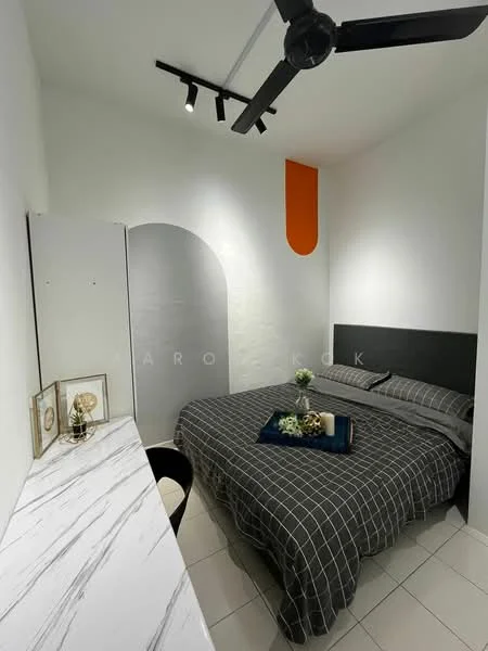 Bedroom features: queen-size bed with grey checkered bedding, white walls, accent wall with orange detail, ceiling fan, recessed downlights, marble-patterned bedside table, decorative plant on bed, framed artwork on bedside table, tile flooring; style: modern.