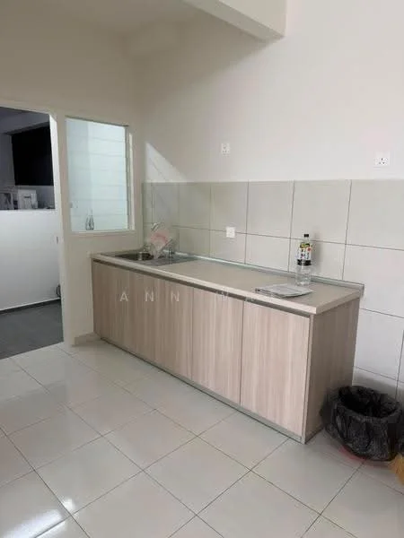 Kitchen features: laminate cabinetry in light wood finish, grey countertop, single-bowl stainless-steel sink, chrome pull-down faucet, white tiled backsplash, white painted walls, ceramic tile flooring, window with sheer curtains, built-in storage cabinet, kitchen appliances visible in background; style: modern.
