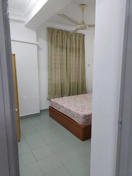 Bedroom features: single bed with floral bedding, green tiled flooring, white painted walls, curtains in light brown, ceiling fan, built-in wardrobe, window with natural light.