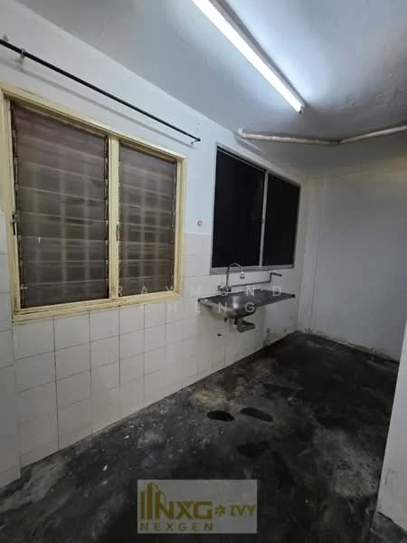 Laundry features: single-bowl stainless-steel sink, chrome faucet, white tiled walls, grey concrete flooring, two windows with metal grilles, fluorescent ceiling lights.