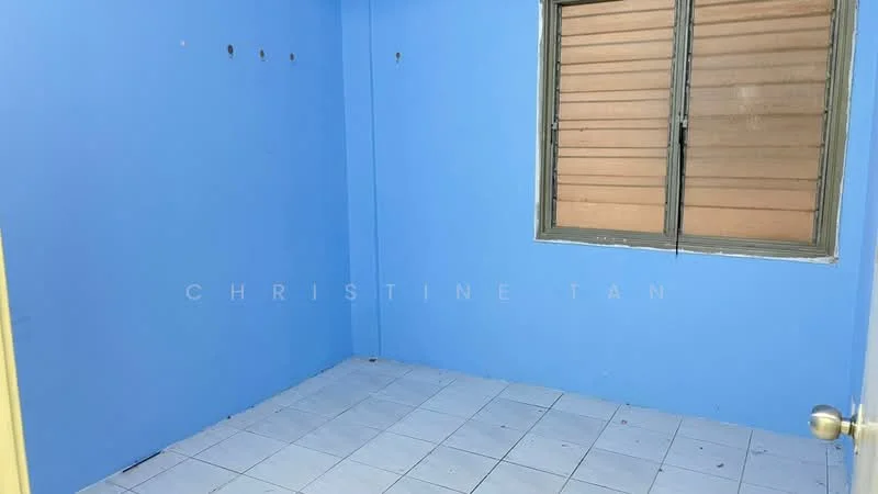 Room features: blue painted walls, white tiled flooring, window with horizontal slats, no visible furniture or decor, empty room.