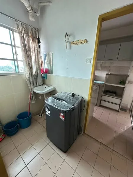 Laundry features: washing machine, window with green view, white tiled walls, light beige tiled flooring, curtains, plastic laundry basket, two blue plastic buckets, shelf, light fixture; view: green.