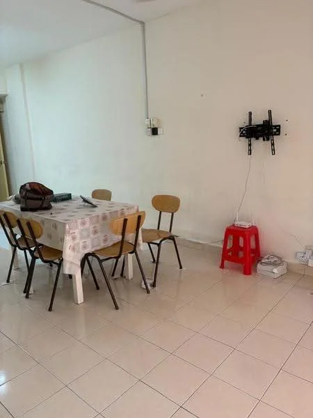 Room features: dining table with tablecloth, four wooden chairs, white tiled flooring, plain white walls, wall-mounted TV bracket, red plastic stool, electrical outlet on wall, cable management visible; style: minimalist.