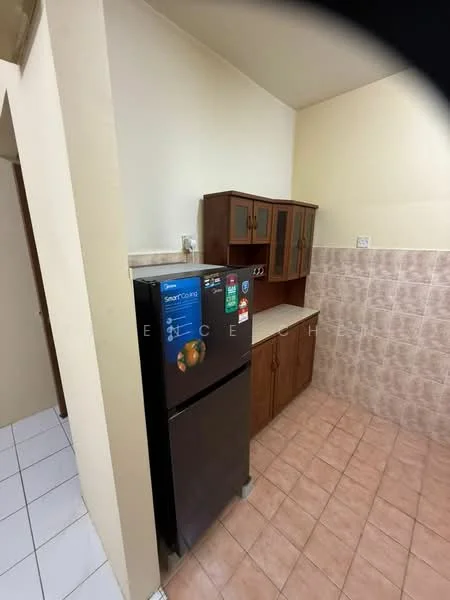 Kitchen features: brown wooden cabinetry, white countertop, black refrigerator, tile backsplash, pink ceramic tile flooring, cream painted walls, wall-mounted cabinet, sink, kitchen appliances, open shelving.